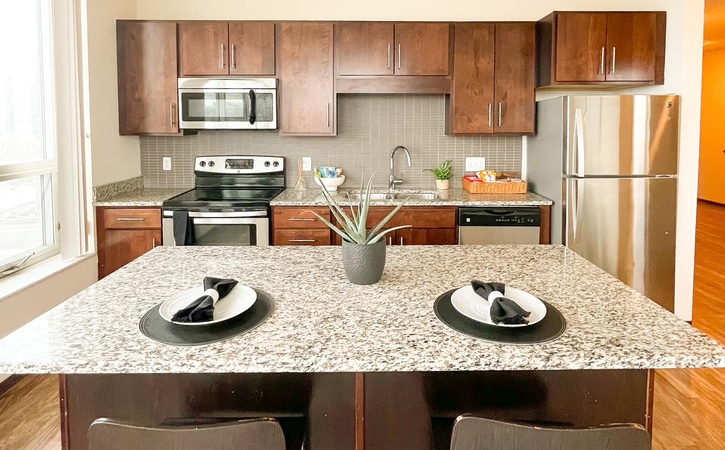 the knoll dinkytown apartments near the university of minnesota kitchen extra wide island with seating stainless steel appliances granite countertops 1