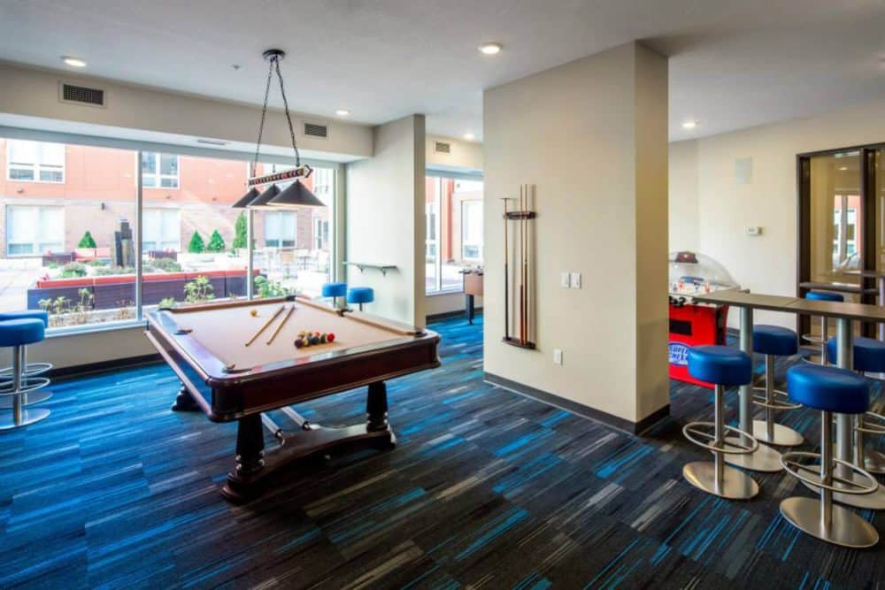 the knoll dinkytown off campus apartments near the university of minnesota resident clubhouse clubroom game room billiard table